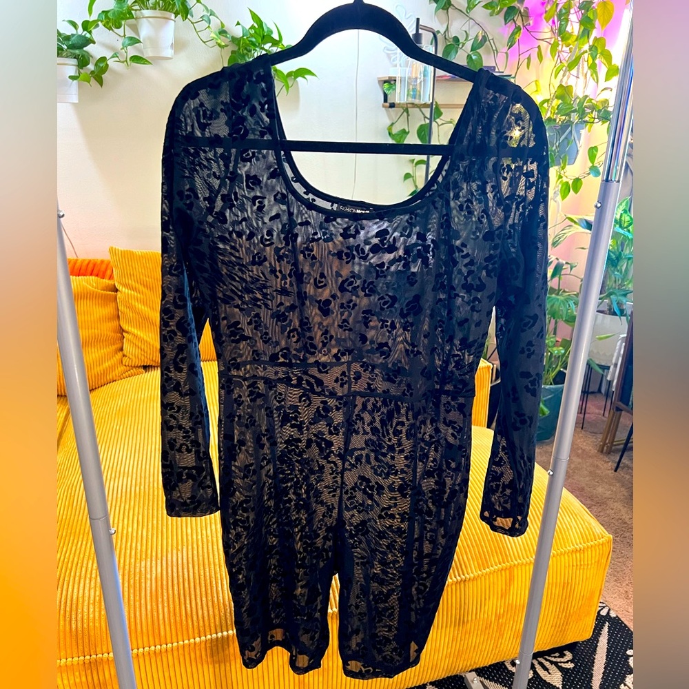 Sheer Black long sleeve Leopard print romper Brand New Never worn